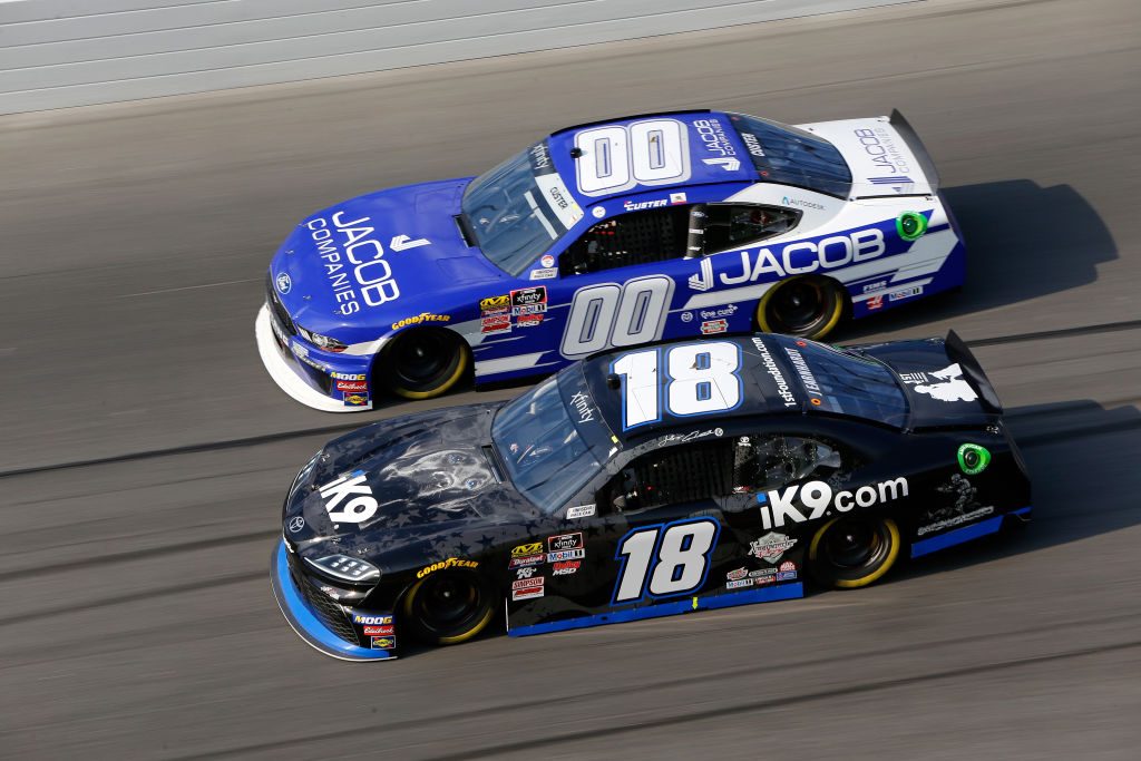 DAYTONA BEACH, FL - FEBRUARY 16: Jeffrey Earnhardt, driver of the #18 iK9 Toyota, drives next to Cole Custer, driver of the #00 Jacob Companies Ford, during the NASCAR Xfinity Series NASCAR Racing Experience 300 at Daytona International Speedway on February 16, 2019 in Daytona Beach, Florida. (Photo by Jonathan Ferrey/Getty Images) | Getty Images