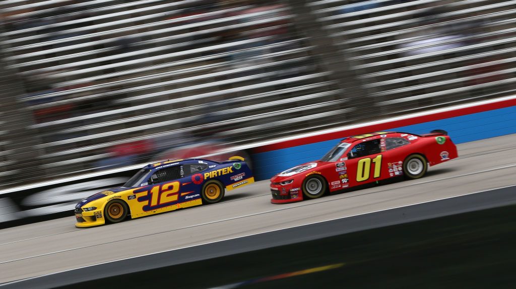 FORT WORTH, TX - MARCH 30: Brad Keselowski, driver of the #12 Pirtek Ford, races, Stephen Leicht, driver of the #01 teamjdmotorsports.com Chevrolet, during the NASCAR Xfinity Series My Bariatric Solutions 300 at Texas Motor Speedway on March 30, 2019 in Fort Worth, Texas. (Photo by Brian Lawdermilk/Getty Images) | Getty Images