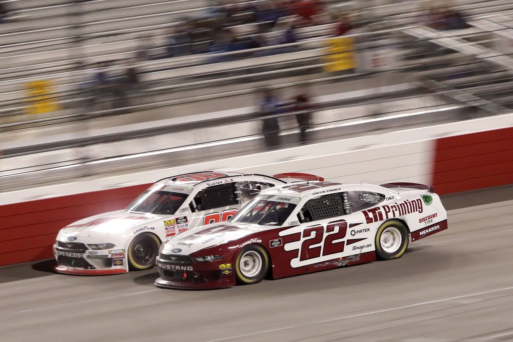 RICHMOND, VA - APRIL 12: Cole Custer, driver of the #00 Haas Automation Ford, leads Austin Cindric, driver of the #22 LTi Printing Ford, during the NASCAR Xfinity Series ToyotaCare 250 at Richmond Raceway on April 12, 2019 in Richmond, Virginia. (Photo by Donald Page/Getty Images) | Getty Images