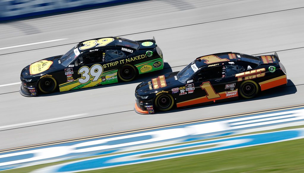 TALLADEGA, AL - APRIL 27: Ryan Sieg, driver of the #39 Larry's Hard Lemonade Chevrolet, races, Michael Annett, driver of the #1 TMC Transportation Chevrolet, during the NASCAR Xfinity Series MoneyLion 300 at Talladega Superspeedway on April 27, 2019 in Talladega, Alabama. (Photo by Brian Lawdermilk/Getty Images) | Getty Images