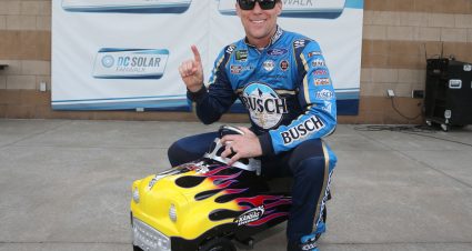 KANSAS CITY, KS - MAY 10:  Kevin Harvick, driver of the #4 Busch Beer Ford, poses with the Pole Award following qualifying for the Monster Energy NASCAR Cup Series Digital Ally 400 at Kansas Speedway on May 10, 2019 in Kansas City, Kansas.  (Photo by Brian Lawdermilk/Getty Images) | Getty Images
