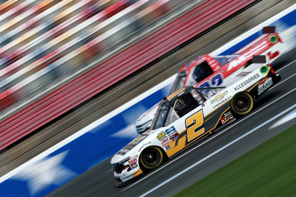 CHARLOTTE, NC - MAY 17: Sheldon Creed, driver of the #2 Chevrolet Accessories Chevrolet, and Austin Wayne Self, driver of the #22 GO TEXAN/AM Technical Solutions Chevrolet, practice for the NASCAR Gander Outdoors Truck Series North Carolina Education Lottery 200 at Charlotte Motor Speedway on May 17, 2019 in Charlotte, North Carolina. (Photo by Sean Gardner/Getty Images) | Getty Images