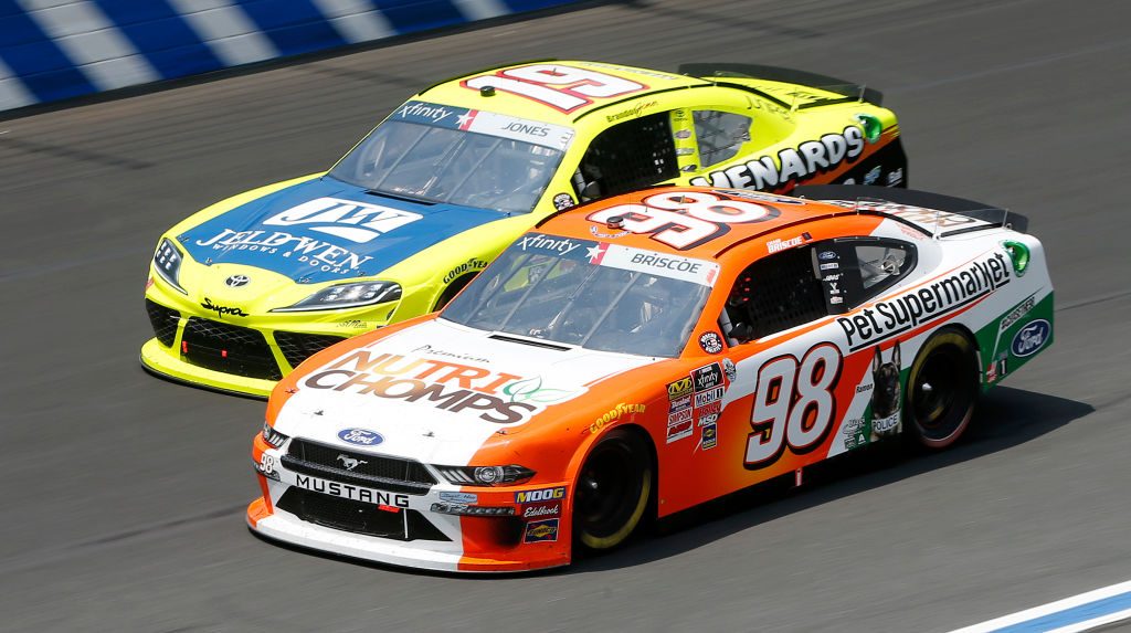 CHARLOTTE, NORTH CAROLINA - MAY 25: Chase Briscoe, driver of the #98 Nutri Chomps/Pet Supermarket Ford, and, Brandon Jones, driver of the #19 Menards/Jeld-Wen Toyota, race during the NASCAR Xfinity Series Alsco 300 at Charlotte Motor Speedway on May 25, 2019 in Charlotte, North Carolina. (Photo by Brian Lawdermilk/Getty Images) | Getty Images