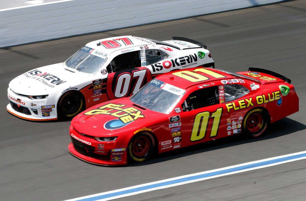 CHARLOTTE, NORTH CAROLINA - MAY 25: Ray Black II, driver of the #07 ISOKERN Fireplaces /Scuba Life Chevrolet, and, Stephen Leicht, driver of the #01 Flex Glue Chevrolet, race during the NASCAR Xfinity Series Alsco 300 at Charlotte Motor Speedway on May 25, 2019 in Charlotte, North Carolina. (Photo by Brian Lawdermilk/Getty Images) | Getty Images