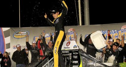 SPARTA, KY - SEPTEMBER 21:  James Buescher, driver of the #31 Wolfpack Rentals Chevrolet, celebrates after winning the NASCAR Camping World Truck Series Kentucky 201 at Kentucky Speedway on September 21, 2012 in Sparta, Kentucky. (Photo by Sean Gardner/Getty Images for NASCAR) | Getty Images