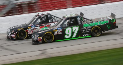 HAMPTON, GA - FEBRUARY 23:  Natalie Decker, driver of the #54 N29 Technologies LLC Toyota, races, Jesse Little, driver of the #97 SkuttleTght/PrkrFbrNt/VisitKingsportTN Ford, during the NASCAR Gander Outdoors Truck Series Ultimate Tailgating 200 at Atlanta Motor Speedway on February 23, 2019 in Hampton, Georgia.  (Photo by Brian Lawdermilk/Getty Images) | Getty Images