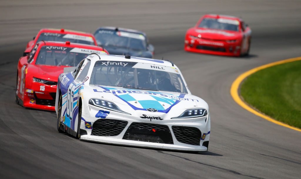 LONG POND, PENNSYLVANIA - JUNE 01: Timmy Hill, driver of the #66 LeithCars.com Toyota, leads a pack of cars during the NASCAR Xfinity Series Pocono Green 250 at Pocono Raceway on June 01, 2019 in Long Pond, Pennsylvania. (Photo by Jonathan Ferrey/Getty Images) | Getty Images
