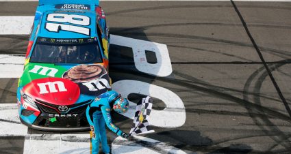LONG POND, PENNSYLVANIA - JUNE 02: Kyle Busch, driver of the #18 M&M's Hazelnut Toyota, celebrates winning the Monster Energy NASCAR Cup Series Pocono 400 at Pocono Raceway on June 02, 2019 in Long Pond, Pennsylvania. (Photo by Jonathan Ferrey/Getty Images) | Getty Images