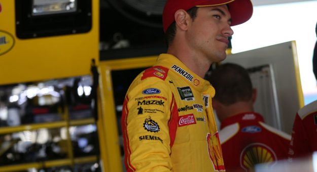 BROOKLYN, MICHIGAN - JUNE 07: Joey Logano, driver of the #22 Shell Pennzoil Ford, stands by his car during practice for the Monster Energy NASCAR Cup Series FireKeepers Casino 400 at Michigan International Speedway on June 07, 2019 in Brooklyn, Michigan. (Photo by Matt Sullivan/Getty Images) | Getty Images