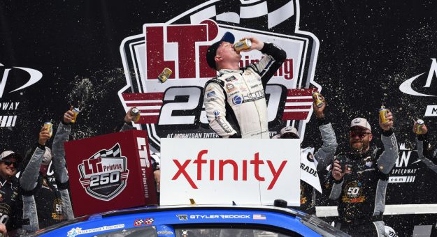BROOKLYN, MICHIGAN - JUNE 08: Tyler Reddick, driver of the #2 KC Motorgroup Chevrolet, celebrates in Victory Lane after winning the NASCAR Xfinity Series LTi Printing 250 at Michigan International Speedway on June 08, 2019 in Brooklyn, Michigan. (Photo by Logan Riely/Getty Images) | Getty Images