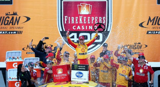 BROOKLYN, MICHIGAN - JUNE 10: Joey Logano, driver of the #22 Shell Pennzoil Ford, celebrates in Victory Lane after winning the Monster Energy NASCAR Cup Series FireKeepers Casino 400 at Michigan International Speedway on June 10, 2019 in Brooklyn, Michigan. (Photo by Matt Sullivan/Getty Images) | Getty Images