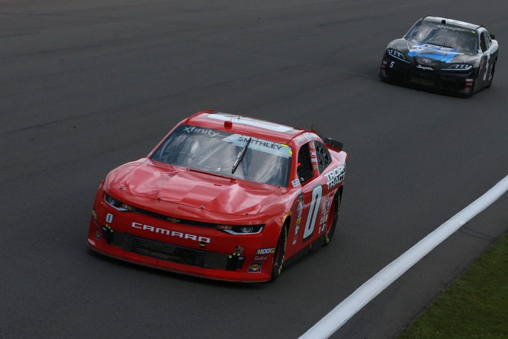WATKINS GLEN, NEW YORK - AUGUST 03: Garrett Smithley, driver of the #0 teamjdmotorsports.com Chevrolet, and Scott Heckert, driver of the #5 Chevrolet, lead a pack of cars during the NASCAR Xfinity Series Zippo 200 at The Glen at Watkins Glen International on August 03, 2019 in Watkins Glen, New York. (Photo by Sean Gardner/Getty Images) | Getty Images