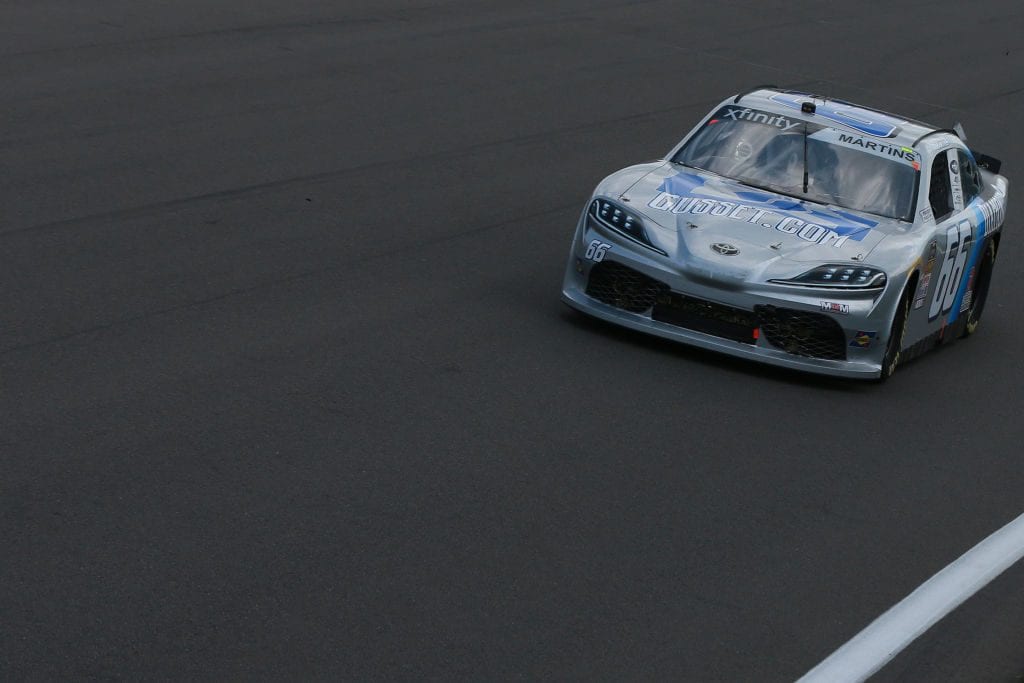 WATKINS GLEN, NEW YORK - AUGUST 03: Tommy Joe Martins, driver of the #66 Gusset.com Toyota, leads a pack of cars during the NASCAR Xfinity Series Zippo 200 at The Glen at Watkins Glen International on August 03, 2019 in Watkins Glen, New York. (Photo by Sean Gardner/Getty Images) | Getty Images