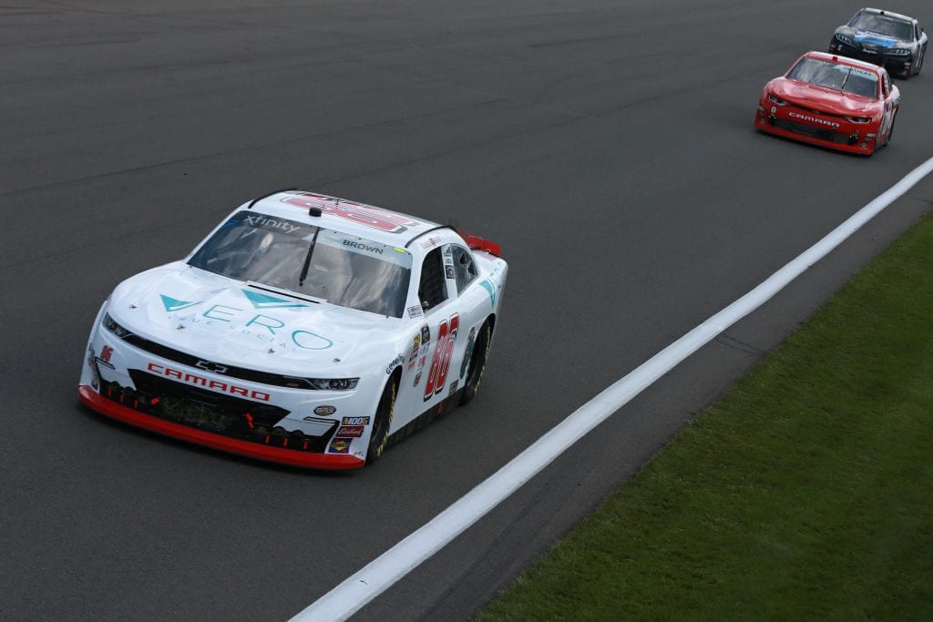 WATKINS GLEN, NEW YORK - AUGUST 03: Brandon Brown, driver of the #86 Vero Tru Social Chevrolet, leads a pack of cars during the NASCAR Xfinity Series Zippo 200 at The Glen at Watkins Glen International on August 03, 2019 in Watkins Glen, New York. (Photo by Sean Gardner/Getty Images) | Getty Images