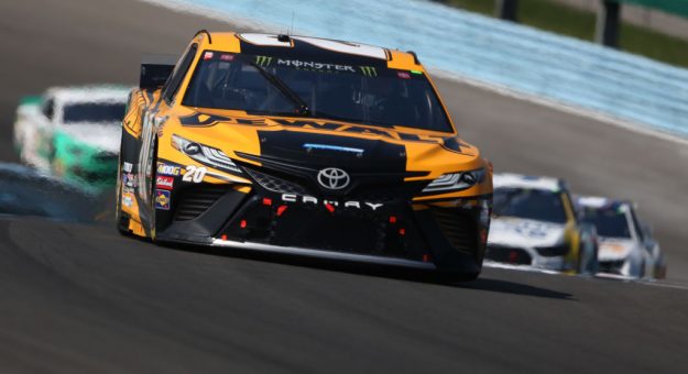 WATKINS GLEN, NEW YORK - AUGUST 04: Erik Jones, driver of the #20 DeWalt Toyota, leads a pack of cars during the Monster Energy NASCAR Cup Series Go Bowling at The Glen at Watkins Glen International on August 04, 2019 in Watkins Glen, New York. (Photo by Brian Lawdermilk/Getty Images) | Getty Images