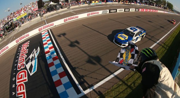 WATKINS GLEN, NEW YORK - AUGUST 04: Chase Elliott, driver of the #9 NAPA AUTO PARTS Chevrolet, takes the checkered flag to win the Monster Energy NASCAR Cup Series Go Bowling at The Glen at Watkins Glen International on August 04, 2019 in Watkins Glen, New York. (Photo by Sean Gardner/Getty Images) | Getty Images