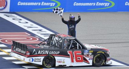 BROOKLYN, MICHIGAN - AUGUST 10: Austin Hill, driver of the #16 Hino/AISIN Group Toyota, celebrates after winning the NASCAR Gander Outdoor Truck Series Corrigan Oil 200 at Michigan International Speedway on August 10, 2019 in Brooklyn, Michigan. (Photo by Quinn Harris/Getty Images) | Getty Images