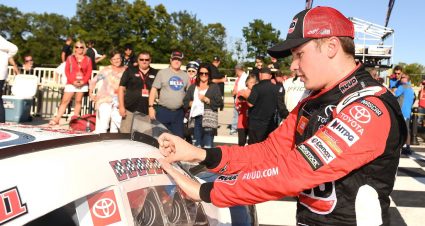 ELKHART LAKE, WISCONSIN - AUGUST 24: Christopher Bell, driver of the #20 Rudd Toyota, applies the winner's sticker after winning the NASCAR Xfinity Series CTECH Manufacturing 180 at Road America on August 24, 2019 in Elkhart Lake, Wisconsin. (Photo by Stacy Revere/Getty Images) | Getty Images