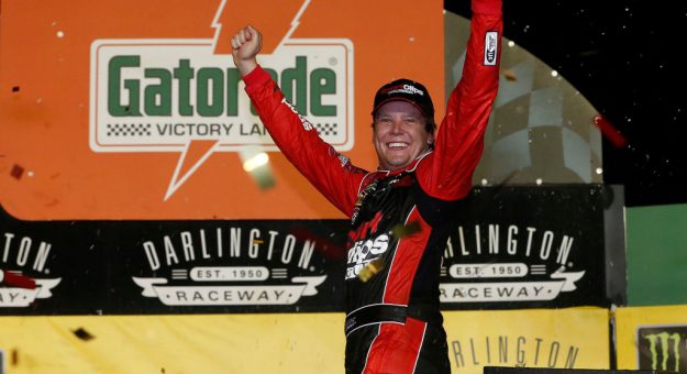 DARLINGTON, SOUTH CAROLINA - SEPTEMBER 02: Erik Jones, driver of the #20 Sport Clips Throwback Toyota, celebrates in Victory Lane after winning the Monster Energy NASCAR Cup Series Bojangles' Southern 500 at Darlington Raceway on September 02, 2019 in Darlington, South Carolina. (Photo by Brian Lawdermilk/Getty Images) | Getty Images