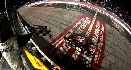 DARLINGTON, SOUTH CAROLINA - SEPTEMBER 02: Erik Jones, driver of the #20 Sport Clips Throwback Toyota, takes the checkered flag to win the Monster Energy NASCAR Cup Series Bojangles' Southern 500 at Darlington Raceway on September 02, 2019 in Darlington, South Carolina. (Photo by Sean Gardner/Getty Images) | Getty Images