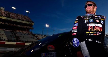 RICHMOND, VIRGINIA - SEPTEMBER 20: Chris Buescher, driver of the #37 Fast Lane to Flavor Chevrolet, stands on the grid during qualifying for the Monster Energy NASCAR Cup Series Federated Auto Parts 400 at Richmond Raceway on September 20, 2019 in Richmond, Virginia. (Photo by Jared C. Tilton/Getty Images) | Getty Images