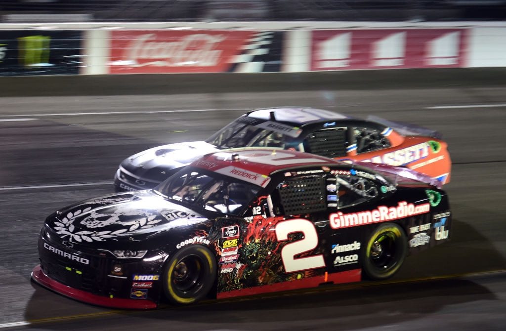 RICHMOND, VIRGINIA - SEPTEMBER 20: Tyler Reddick, driver of the #2 Gimme Radio Chevrolet, races Dillon Bassett, driver of the #90 Bassett Gutters and More Chevrolet, during the NASCAR Xfinity Series GoBowling 250 at Richmond Raceway on September 20, 2019 in Richmond, Virginia. (Photo by Jared C. Tilton/Getty Images) | Getty Images