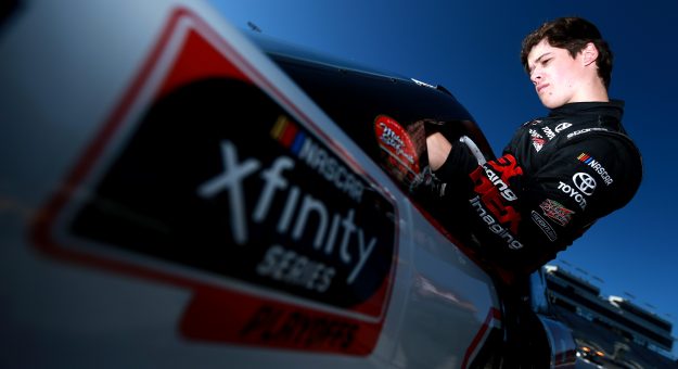 RICHMOND, VIRGINIA - SEPTEMBER 20: Harrison Burton, driver of the #18 DEX Imaging Toyota, climbs into his car during practice for the NASCAR Xfinity Series GoBowling 250 at Richmond Raceway on September 20, 2019 in Richmond, Virginia. (Photo by Sean Gardner/Getty Images) | Getty Images