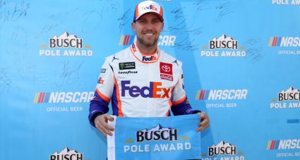 DOVER, DELAWARE - OCTOBER 05: Denny Hamlin, driver of the #11 FedEx Express Toyota, poses with the pole award after qualifying for the Monster Energy NASCAR Cup Series Drydene 400 at Dover International Speedway on October 05, 2019 in Dover, Delaware. (Photo by Matt Sullivan/Getty Images) | Getty Images