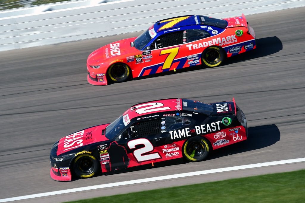 KANSAS CITY, KANSAS - OCTOBER 19: Tyler Reddick, driver of the #2 TAME the BEAST Chevrolet, races Justin Allgaier, driver of the #7 Trademark Nitrojen/BRANDT Chevrolet, during the NASCAR Xfinity Series Kansas Lottery 300 at Kansas Speedway on October 19, 2019 in Kansas City, Kansas. (Photo by Jared C. Tilton/Getty Images) | Getty Images