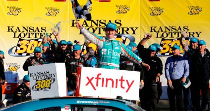 KANSAS CITY, KANSAS - OCTOBER 19: Brandon Jones, driver of the #19 Flow Toyota, celebrates in victory lane after winning the NASCAR Xfinity Series Kansas Lottery 300 at Kansas Speedway on October 19, 2019 in Kansas City, Kansas. (Photo by Jonathan Ferrey/Getty Images) | Getty Images