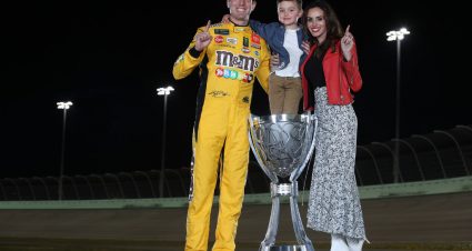 HOMESTEAD, FLORIDA - NOVEMBER 17: Kyle Busch, driver of the #18 M&M's Toyota along with his wife Samantha and son Brexton pose with the trophy after winning the Monster Energy NASCAR Cup Series Championship at Homestead Speedway on November 17, 2019 in Homestead, Florida. (Photo by Chris Graythen/Getty Images) | Getty Images