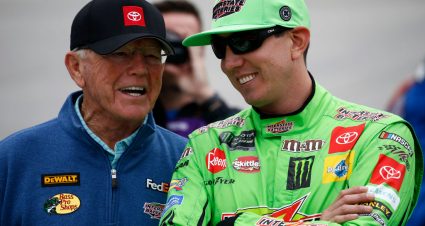 DOVER, DELAWARE - OCTOBER 06: Kyle Busch, driver of the #18 Interstate Batteries Toyota, talks with team owner, Joe Gibbs, prior to the start of the Monster Energy NASCAR Cup Series Drydene 400 at Dover International Speedway on October 06, 2019 in Dover, Delaware. (Photo by Jeff Zelevansky/Getty Images)
