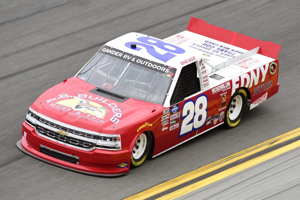 DAYTONA BEACH, FLORIDA - FEBRUARY 14: Bryan Dauzat, driver of the #28 FDNY/AMERICAN GENOMICS Chevrolet, qualifies for the NASCAR Gander RV & Outdoors Truck Series NextEra Energy 250 at Daytona International Speedway on February 14, 2020 in Daytona Beach, Florida. (Photo by Jared C. Tilton/Getty Images) | Getty Images