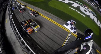 DAYTONA BEACH, FLORIDA - FEBRUARY 14: Grant Enfinger, driver of the #98 Champion/Curb Records Ford, crosses the finish line ahead of Jordan Anderson, driver of the #3 K-Seal/Bommarito.com Chevrolet, to win the NASCAR Gander RV & Outdoors Truck Series NextEra Energy 250 at Daytona International Speedway on February 14, 2020 in Daytona Beach, Florida. (Photo by Jared C. Tilton/Getty Images) | Getty Images