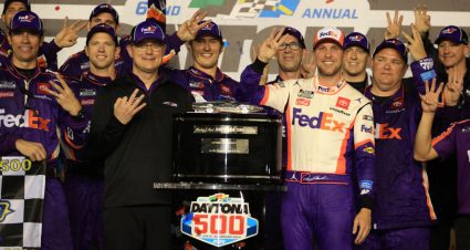 DAYTONA BEACH, FLORIDA - FEBRUARY 17: Denny Hamlin, driver of the #11 FedEx Express Toyota, celebrates in Victory Lane after winning  the NASCAR Cup Series 62nd Annual Daytona 500 at Daytona International Speedway on February 17, 2020 in Daytona Beach, Florida. (Photo by Chris Graythen/Getty Images) | Getty Images