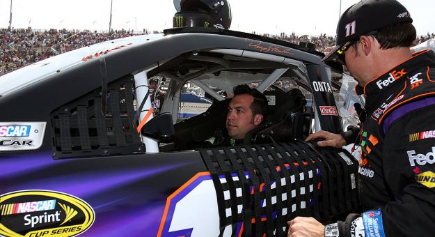 FONTANA, CA - MARCH 23:  Sam Hornish Jr., driver of the #11 FedEx Express Toyota, prepares for the NASCAR Sprint Cup Series Auto Club 400 at Auto Club Speedway on March 23, 2014 in Fontana, California.  Hornish is replacing Denny Hamlin who was not cleared to race due to illness.  (Photo by Todd Warshaw/Getty Images) | Getty Images