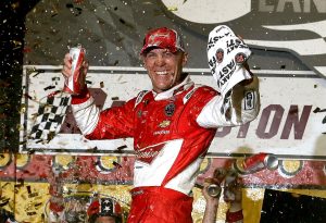 DARLINGTON, SC - APRIL 12:  Kevin Harvick, driver of the #4 Budweiser Chevrolet, celebrates in Victory Lane after winning the NASCAR Sprint Cup Series Bojangles' Southern 500 at Darlington Raceway on April 12, 2014 in Darlington, South Carolina.  (Photo by Nick Laham/NASCAR via Getty Images)