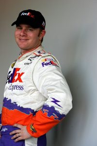 DAYTONA, FL - JANUARY 12: Jason Leffler, driver of the #11 FedEx Chevrolet, poses during Nascar Nextel Cup testing, on January 12, 2005 at Daytona International Speedway in Daytona, Florida. (Photo by Streeter Lecka/Getty Images) | Getty Images