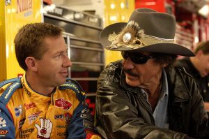 CHARLOTTE, NC - MAY 24: John Andretti, driver of the #43 Cherrios Dodge Intrepid, chats with Richard Petty during practice for the Coca- Cola 600 on May 24, 2003 at Lowes Motor Speedway in Charlotte, North Carolina. (Photo By Rusty Jarrett/Getty Images) | Getty Images