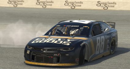 TALLADEGA, ALABAMA - APRIL 26: (EDITORIAL USE ONLY) (Editors note: This image was computer generated in-game)   Alex Bowman, driver of the #88 Chevy Goods Chevrolet, celebrates after winning the eNASCAR iRacing Pro Invitational Series Geico 70 at Talladega Superspeedway on April 26, 2020 in Talladega, Alabama. (Photo by Chris Graythen/Getty Images) | Getty Images
