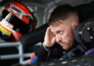 CHARLOTTE, NORTH CAROLINA - MAY 23: Jeb Burton, driver of the #8 State Water Heaters Chevrolet, looks on in the garage at Charlotte Motor Speedway on May 23, 2019 in Charlotte, North Carolina. (Photo by Streeter Lecka/Getty Images) | Getty Images
