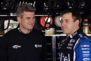 KANSAS CITY, KS - OCTOBER 7: Crew chief Matt Borland (L) and Ryan Newman, driver of the #12 Alltel Dodge, talk during practice for the NASCAR Nextel Cup Series Banquet 400 on October 7, 2005 at the Kansas Speedway in Kansas City, Kansas. (Photo by Rusty Jarrett/Getty Images) | Getty Images