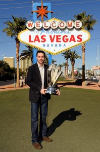 LAS VEGAS - DECEMBER 02: 2009 NASCAR Sprint Cup Series Champion Jimmie Johnson poses with the trophy during Day 1 of the NASCAR Sprint Cup Series Champions Week on December 2, 2009 in Las Vegas, Nevada. (Photo by Rusty Jarrett/Getty Images for NASCAR) | Getty Images