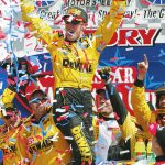 8 APR 2002. Matt Kenseth celebrates in victory circle after winning the Samsung/Radio Shack 500, round 7 of the NASCAR Winston Cup Series at the Texas Motor Speedway in Fort Worth, Texas. Mandatory Credit: Robert Laberge/Getty Images.