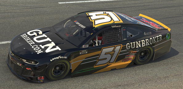 NORTH WILKESBORO, NORTH CAROLINA - MAY 09: (EDITORIAL USE ONLY) (Editors note: This image was computer generated in-game)  Garrett Smithley, driver of the #51 GunBroker.com Chevrolet, races during the eNASCAR iRacing Pro Invitational Series North Wilkesboro 160 at virtual North Wilkesboro Speedway on May 09, 2020 in North Wilkesboro, North Carolina. (Photo by Chris Graythen/Getty Images) | Getty Images