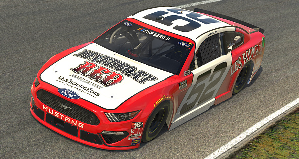 NORTH WILKESBORO, NORTH CAROLINA - MAY 09: (EDITORIAL USE ONLY) (Editors note: This image was computer generated in-game)  JJ Yeley, driver of the #52 Les Bourgeois Vineyards Ford,  races during the eNASCAR iRacing Pro Invitational Series North Wilkesboro 160 at virtual North Wilkesboro Speedway on May 09, 2020 in North Wilkesboro, North Carolina. (Photo by Chris Graythen/Getty Images) | Getty Images
