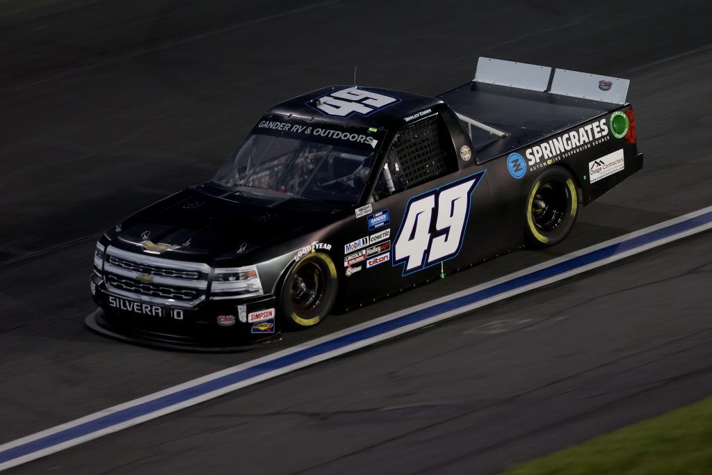 CONCORD, NORTH CAROLINA - MAY 26: Bayley Currey, driver of the #49 CMI Motorsports Chevrolet, drives during the NASCAR Gander Outdoors Trucks Series North Carolina Education Lottery 200 at Charlotte Motor Speedway on May 26, 2020 in Concord, North Carolina. (Photo by Chris Graythen/Getty Images) | Getty Images