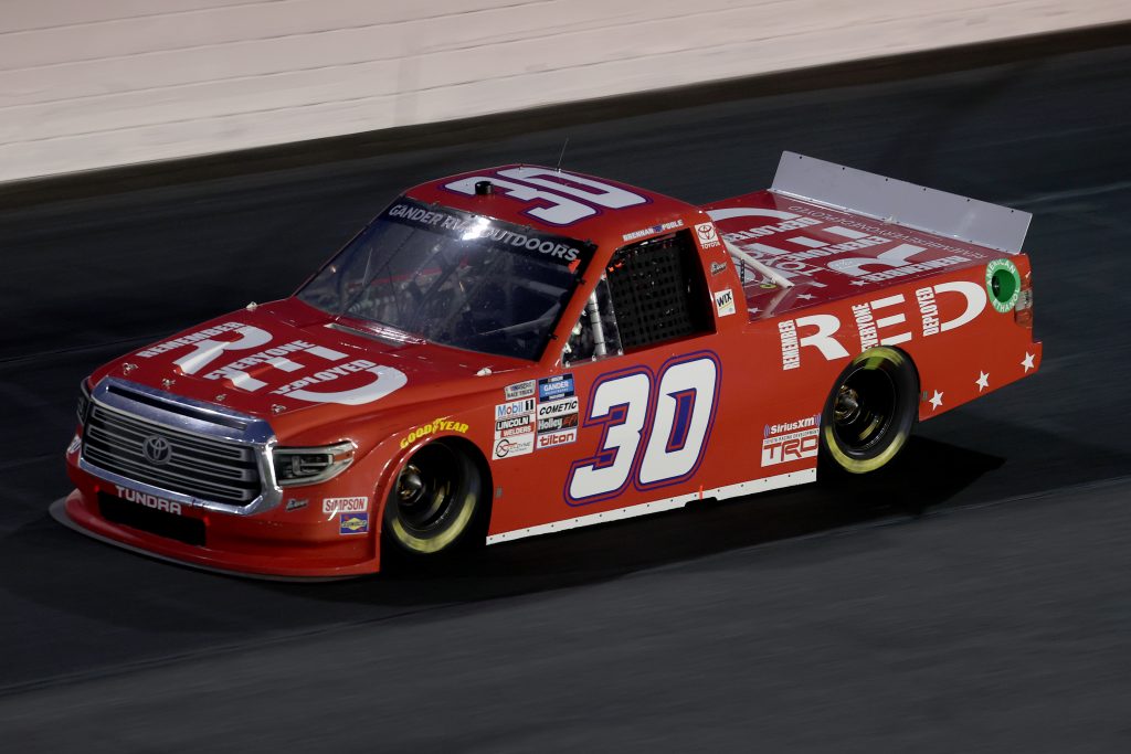 CONCORD, NORTH CAROLINA - MAY 26: Brennan Poole, driver of the #30 (RED) Remember Everyone Deployed Toyota, drives during the NASCAR Gander Outdoors Trucks Series North Carolina Education Lottery 200 at Charlotte Motor Speedway on May 26, 2020 in Concord, North Carolina. (Photo by Chris Graythen/Getty Images) | Getty Images