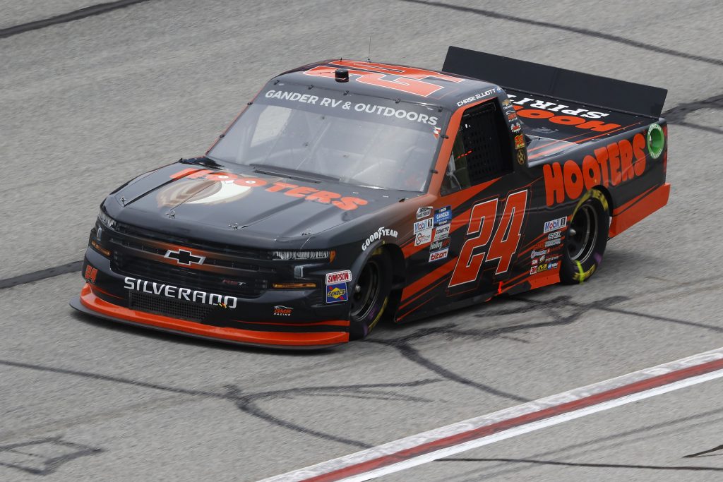 HAMPTON, GEORGIA - JUNE 06: Chase Elliott, driver of the #24 Hooters Chevrolet, races during the NASCAR Gander Outdoors Truck Series Vet Tix Camping World 200 at Atlanta Motor Speedway on June 06, 2020 in Hampton, Georgia. (Photo by Chris Graythen/Getty Images) | Getty Images