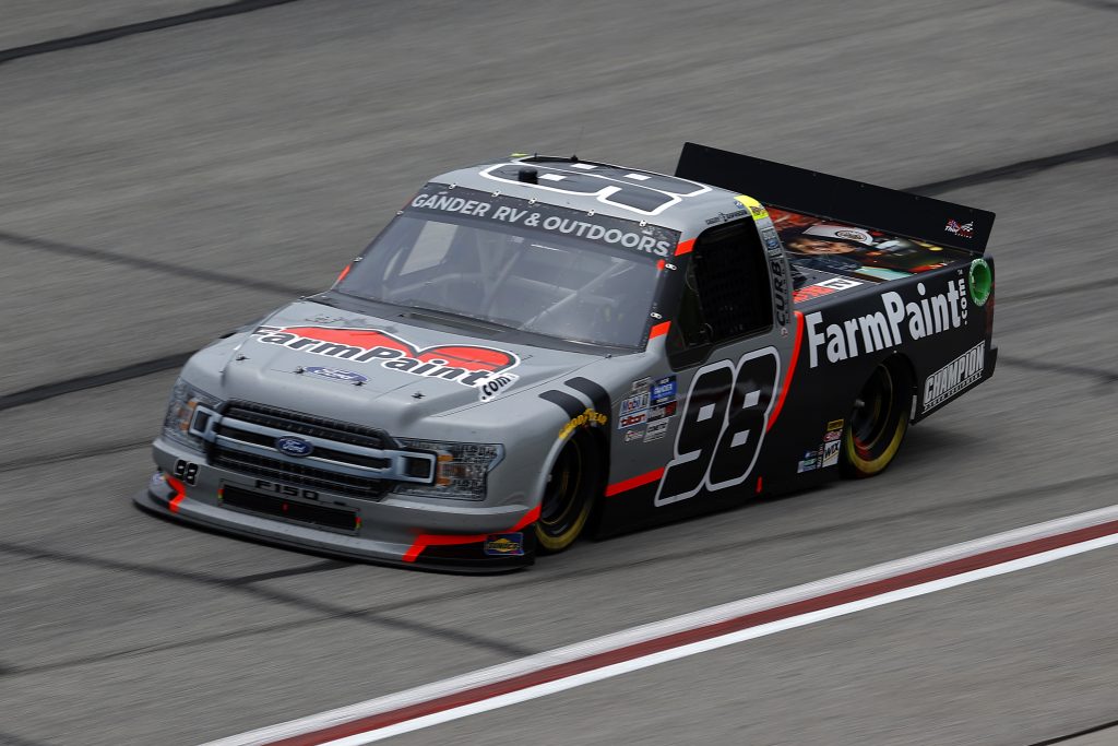 HAMPTON, GEORGIA - JUNE 06: Grant Enfinger, driver of the #98 Farm Paint Ford, drives during the NASCAR Gander Outdoors Truck Series Vet Tix Camping World 200 at Atlanta Motor Speedway on June 06, 2020 in Hampton, Georgia. (Photo by Chris Graythen/Getty Images) | Getty Images